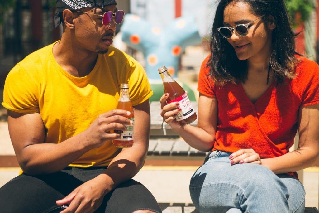 man and woman drinking soda