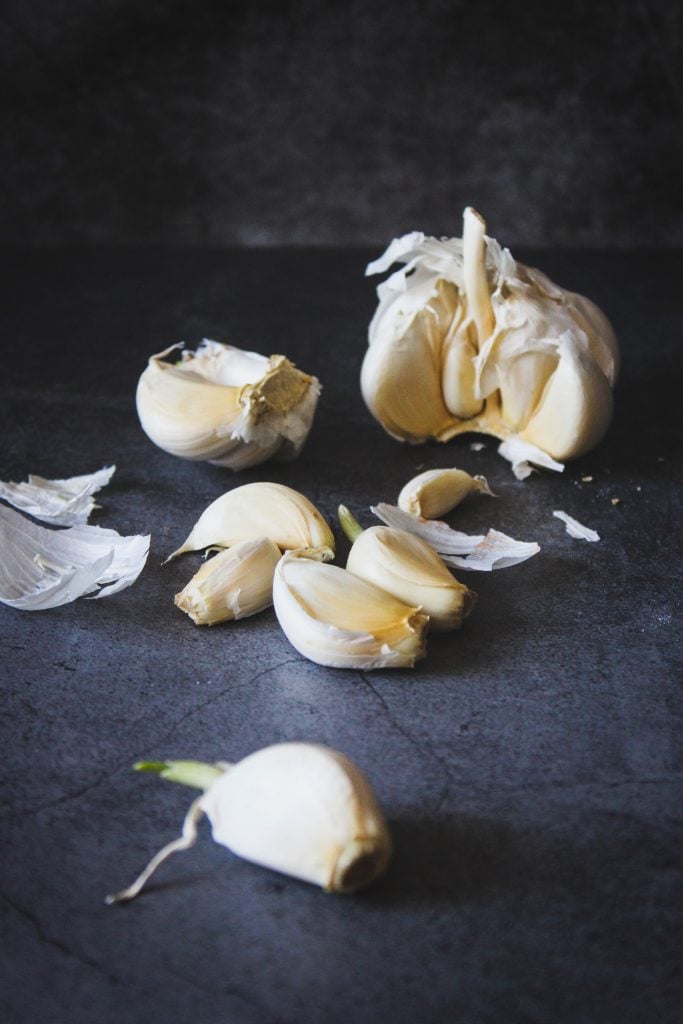 is garlic keto white garlic on black table