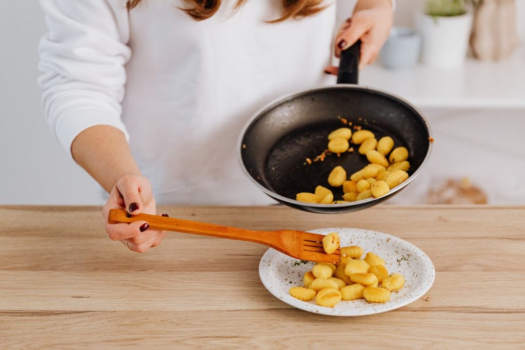 woman cooking with spatula