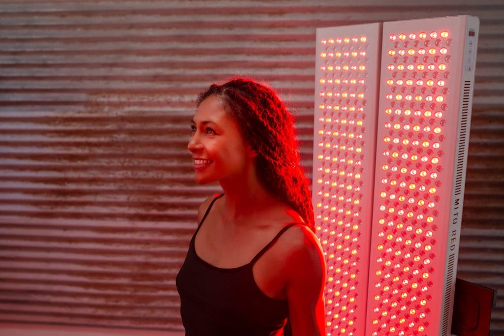 woman using MITO red light panels