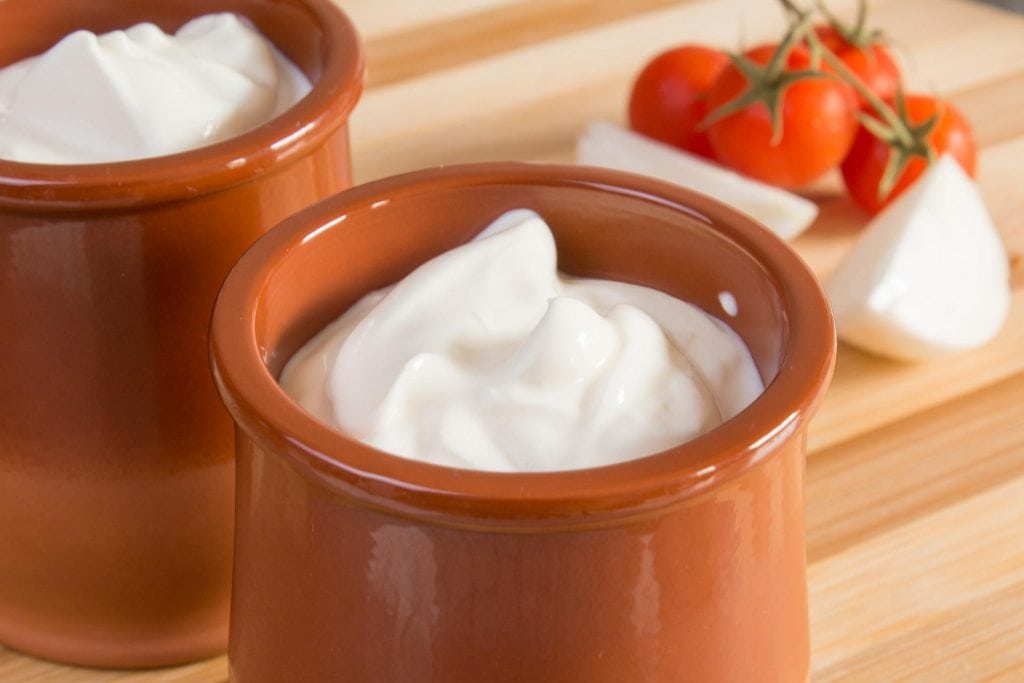 sour cream in a ceramic bowl