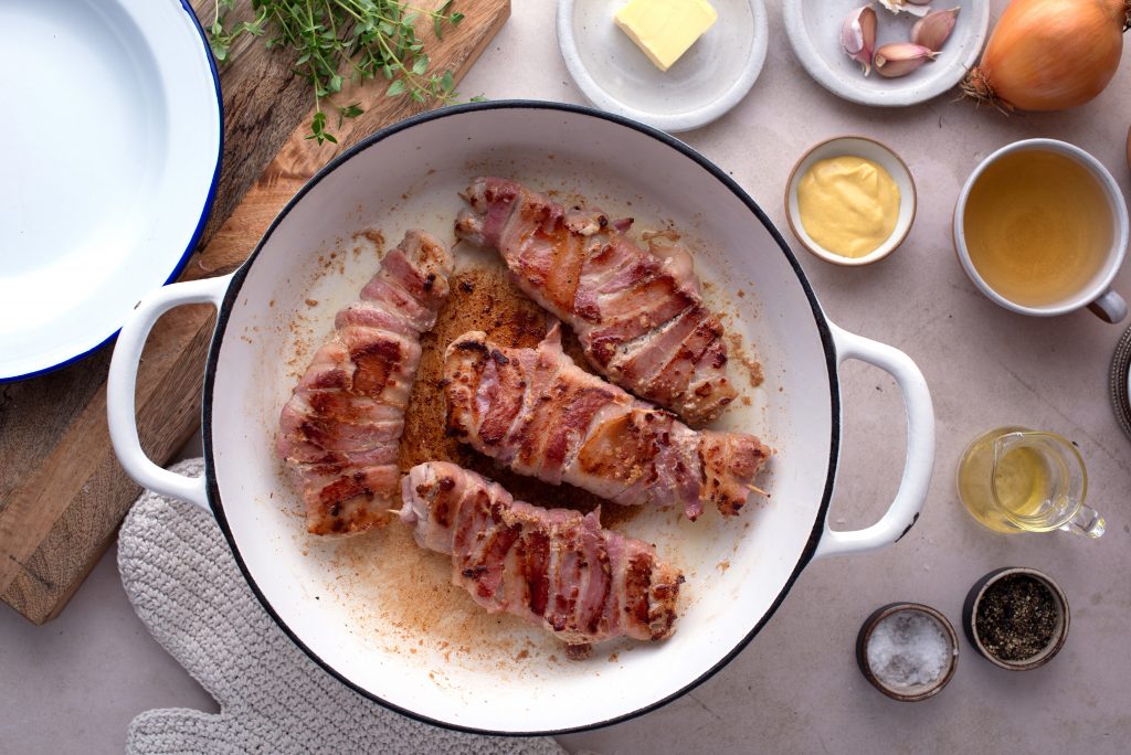 bacon wrapped pork chops Cooking the top and bottom sides of the pork chops