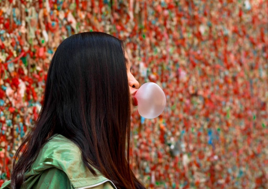 woman chewing keto gum
