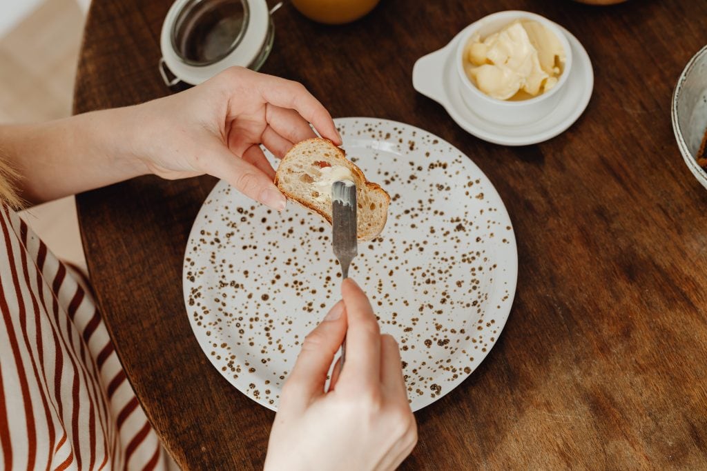 woman eating butter