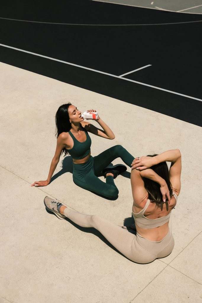 women drinking protein shake