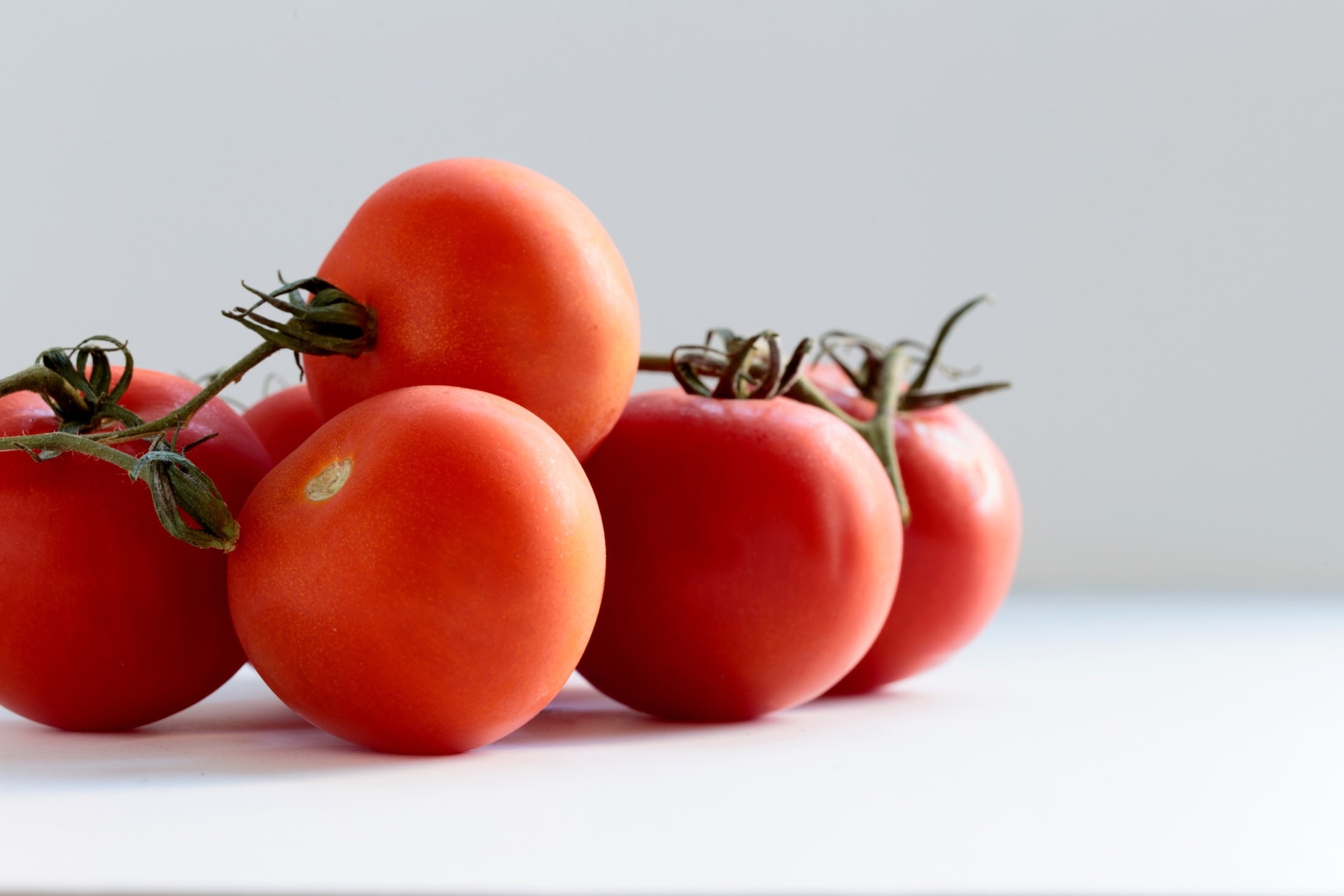 tomatoes lying on a table